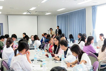 Students from both universities having a pleasant talk